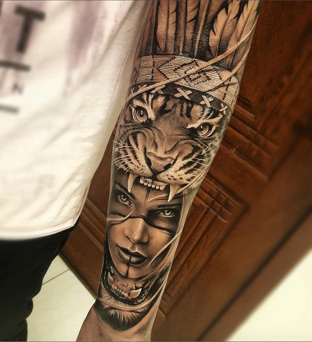 Forearm sleeve tattoo featuring a realistic woman's face and a tiger head.