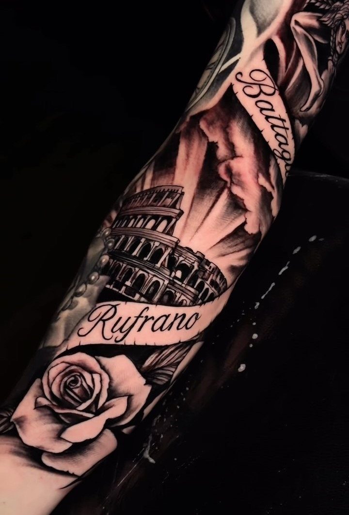 Forearm half sleeve tattoo featuring the Colosseum, a rose, and cursive script text.