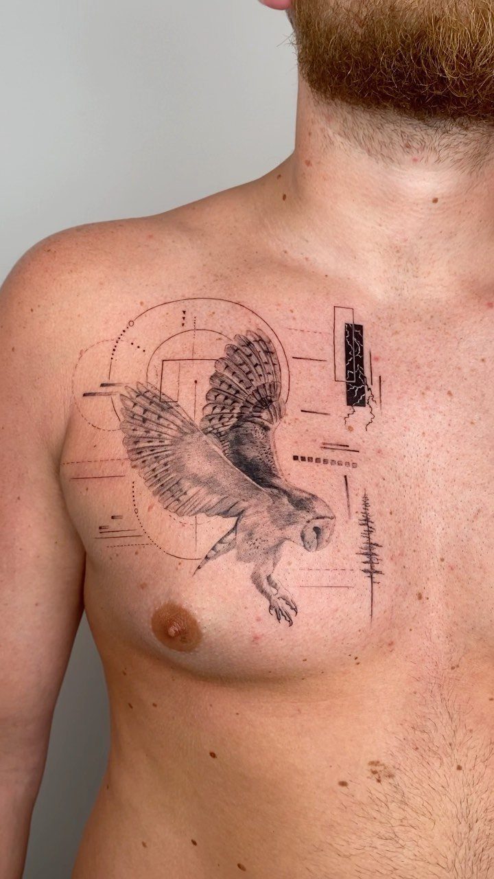 Owl tattoo with geometric elements and a pine tree on a man's chest