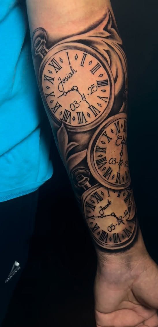 Three pocket watch tattoos with Roman numerals and dates on a man's forearm.