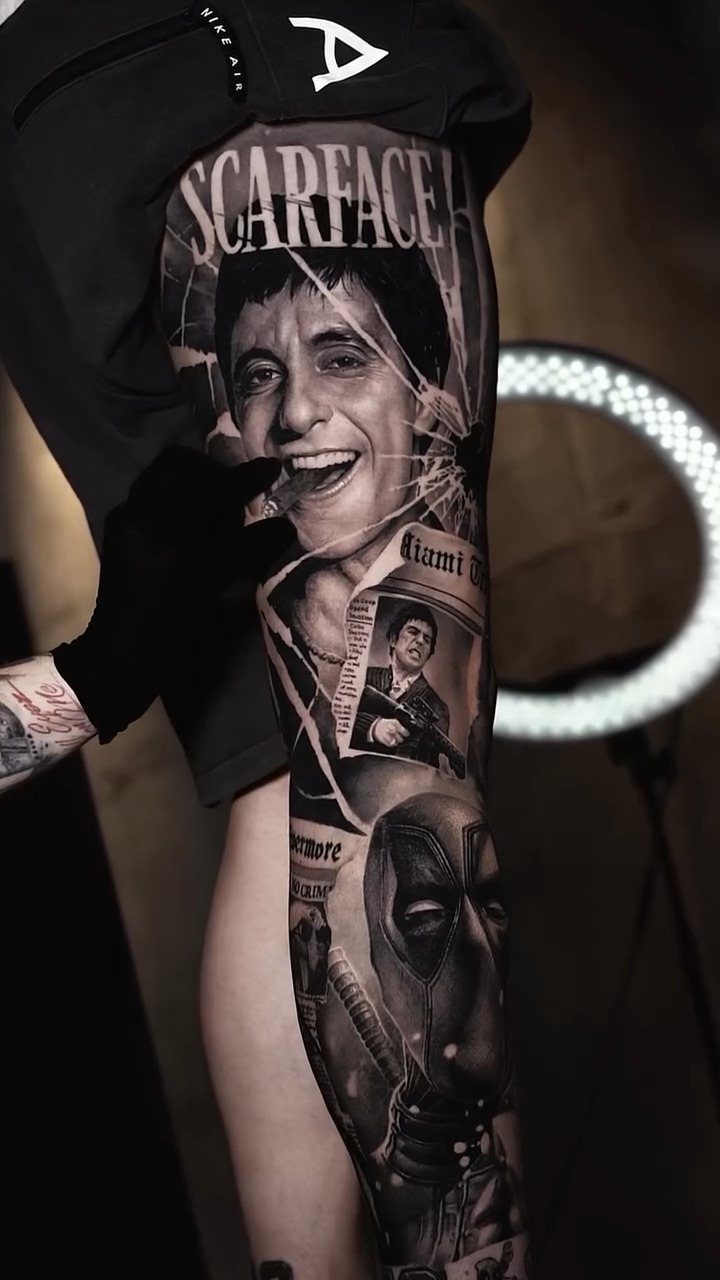 Leg tattoo featuring a black and grey portrait collage of Scarface and Deadpool.