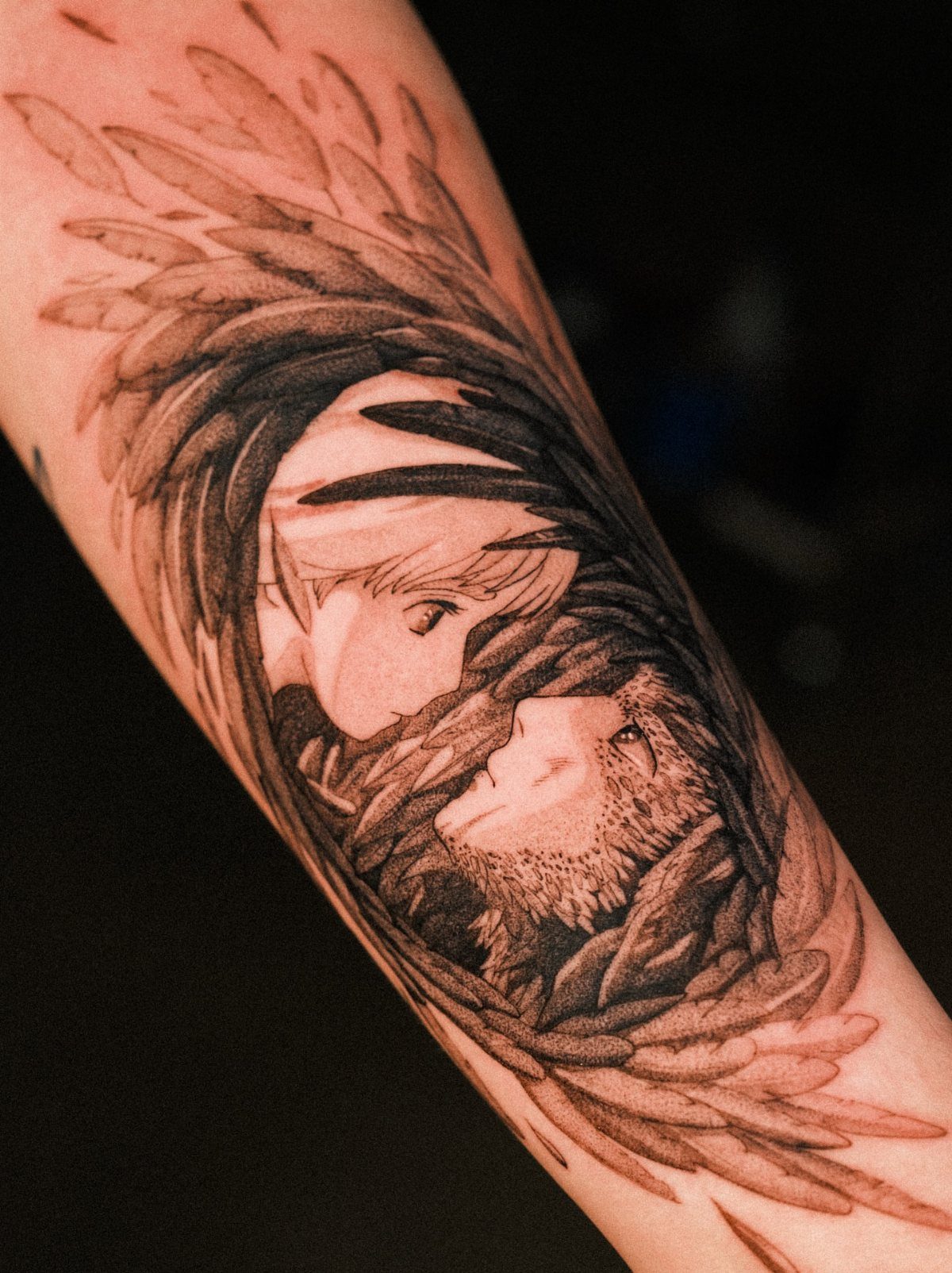 Anime style tattoo of Howl and Sophie on a person's thigh skin