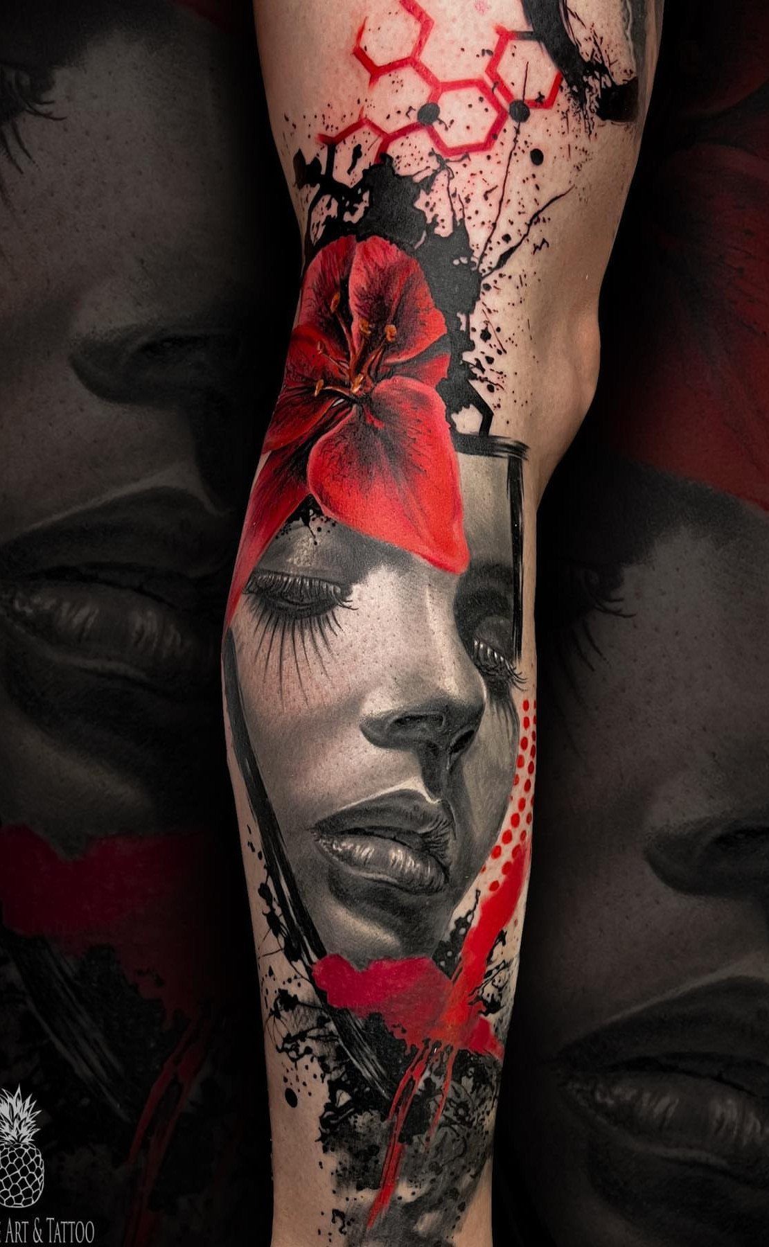 Full sleeve tattoo featuring a realistic woman's face with red floral and abstract elements.